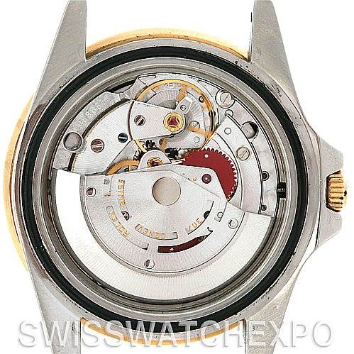 This image shows the inner mechanics of the Vintage Collection model by Rolex from a back case angle.