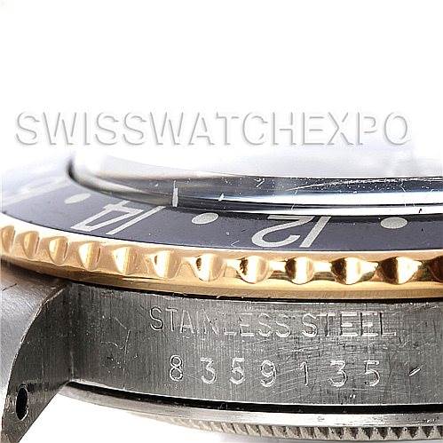 The image shows a close-up of the side, bezel, and part of the face of a Vintage Collection Rolex watch, with the serial number visible.