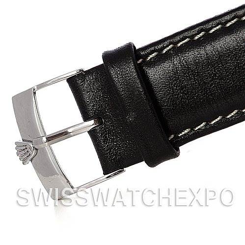This image shows a close-up of the buckle and part of the leather strap of a Vintage Collection model by Rolex.