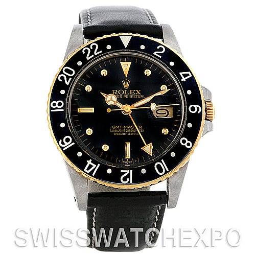 This image shows the front view of a Rolex Vintage Collection 16753 Men's Stainless Steel Black Dial 16753 Men's Stainless Steel Black Dial model displaying its black dial, gold hands, and black leather strap.