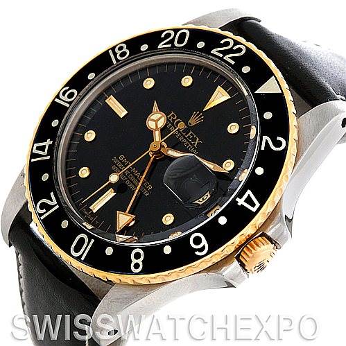 The Rolex Vintage Collection 16753 Men's Stainless Steel Black Dial 16753 Men's Stainless Steel Black Dial watch is shown at an oblique angle, highlighting the black dial, gold markers, bezel, and crown, with a leather strap.