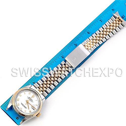 The image shows a Rolex Vintage Collection 16013 Men's Stainless Steel White Dial 16013 Men's Stainless Steel White Dial watch laid flat against a ruler, displaying the dial, bezel, and bracelet from an overhead view.