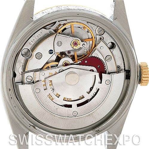 This image shows the internal mechanical components of a Vintage Collection Rolex watch from a straight-on angle.