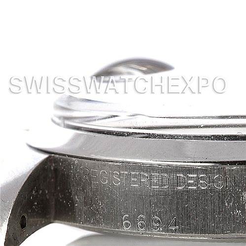 The image shows a close-up side view of a Rolex Vintage Collection 6694 Men's Stainless Steel Black Dial 6694 Men's Stainless Steel Black Dial model, highlighting the case and registered design number 6694.