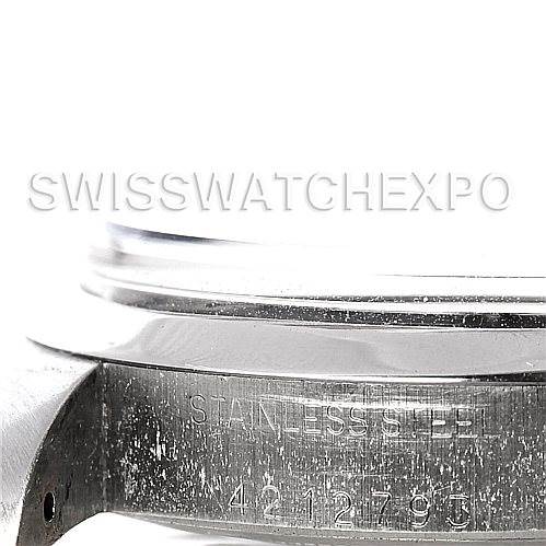 This image shows a close-up of the side of the stainless steel case and bezel of a Rolex Vintage Collection 6694 Men's Stainless Steel Black Dial 6694 Men's Stainless Steel Black Dial watch.