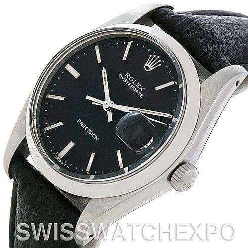 The image shows a close-up of the front and side angle of a Rolex Vintage Collection 6694 Men's Stainless Steel Black Dial 6694 Men's Stainless Steel Black Dial model, highlighting the dial, crown, and leather strap.