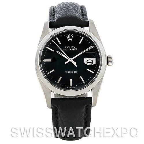 The image shows a front view of a Rolex Vintage Collection 6694 Men's Stainless Steel Black Dial 6694 Men's Stainless Steel Black Dial Oysterdate watch, highlighting its black dial, date window, and leather strap.