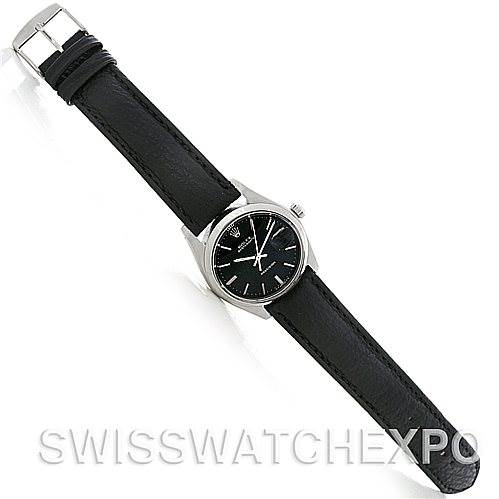 The image shows a top-down view of a Vintage Collection model by Rolex, displaying the entire watch face and leather strap.