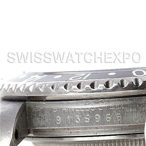 The image shows a side view of a Rolex Vintage Collection 16760 Stainless Steel Black Dial 16760 Stainless Steel Black Dial model, focusing on the stainless steel case and part of the bezel with serial numbers visible.