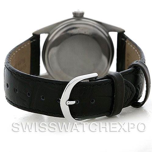 The image shows the back case and leather strap, including the buckle, of a Rolex Vintage Collection 1601 Men's Stainless Steel Black Dial 1601 Men's Stainless Steel Black Dial model watch.