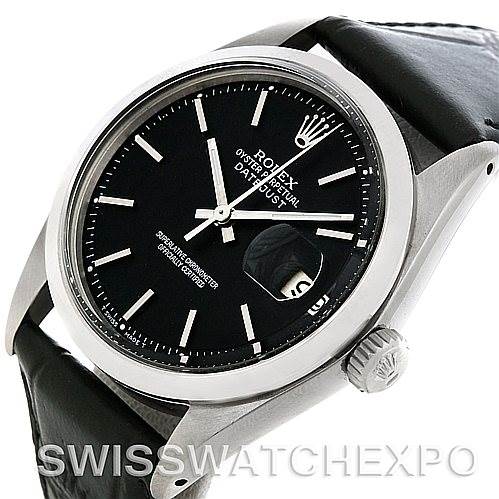 This image shows a side-angle view of the Rolex Vintage Collection 1601 Men's Stainless Steel Black Dial 1601 Men's Stainless Steel Black Dial watch, highlighting the black dial, crown, and leather strap.