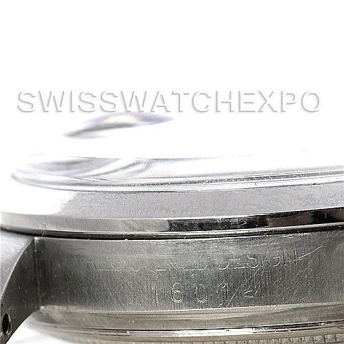 This close-up image of the Rolex Vintage Collection 1601 Men's Stainless Steel Black Dial 1601 Men's Stainless Steel Black Dial model shows the side of the watch case and part of the lugs.