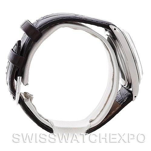 The image shows the side profile of a Rolex Vintage Collection 1601 Men's Stainless Steel Black Dial 1601 Men's Stainless Steel Black Dial watch, highlighting the leather strap and case thickness.