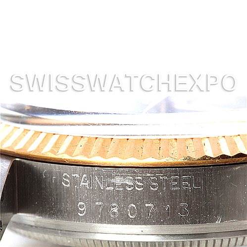 This close-up image shows the stainless steel case and the bezel of a Vintage Collection Rolex watch.
