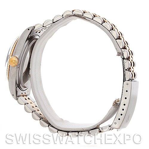 The Vintage Collection Rolex watch is shown from a side angle, highlighting the bracelet, crown, and partially the case.