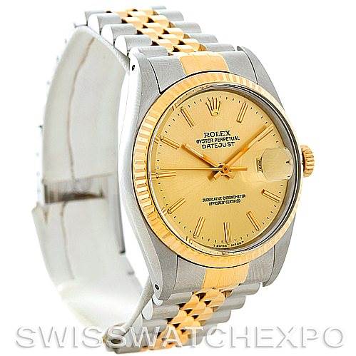 This image shows a side angle view of the Rolex Vintage Collection 16013 Men's Stainless Steel Champagne Dial 16013 Men's Stainless Steel Champagne Dial Datejust watch, highlighting its two-tone bracelet and face.