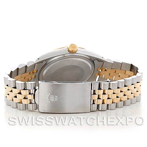 The watch is shown from the back angle, displaying the clasp and bracelet of the Vintage Collection model by Rolex.