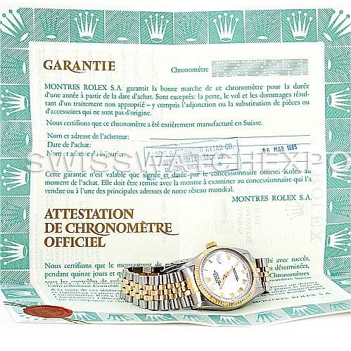 The image shows a Rolex Vintage Collection 16013 Men's Stainless Steel White Dial 16013 Men's Stainless Steel White Dial watch laid on its warranty certificate, displayed from a top-down angle.