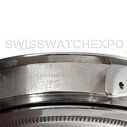 This image shows a close-up of the side, bezel, and engraved serial number on a Rolex Vintage Collection 6239 Men's Stainless Steel Black Dial 6239 Men's Stainless Steel Black Dial watch.