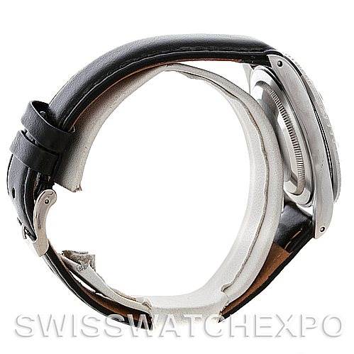 This side view of the Rolex Vintage Collection 1675 Men's Stainless Steel Black Dial 1675 Men's Stainless Steel Black Dial watch shows the case, bezel, and leather strap.