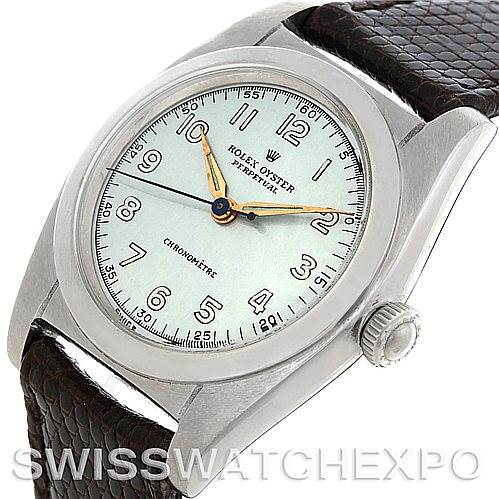 The image shows a close-up angle of the Rolex Vintage Collection 2940 Men's Stainless Steel Silver Dial 2940 Men's Stainless Steel Silver Dial watch, displaying its dial, bezel, and part of the leather strap.