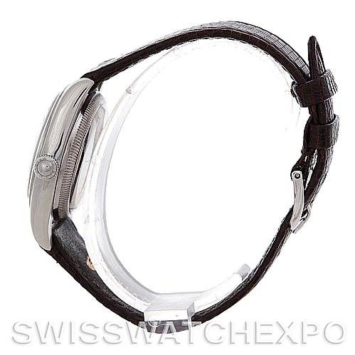 This image shows a side profile of a Rolex Vintage Collection 2940 Men's Stainless Steel Silver Dial 2940 Men's Stainless Steel Silver Dial watch, highlighting the case, crown, and leather strap.