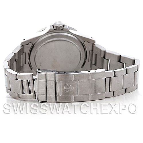 The image shows the back case and bracelet clasp of a Vintage Collection Rolex watch from a rear angle.