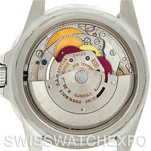 This image shows the interior view of the Rolex Vintage Collection 1680 Men's Stainless Steel Black Dial 1680 Men's Stainless Steel Black Dial watch, revealing the movement and gears.