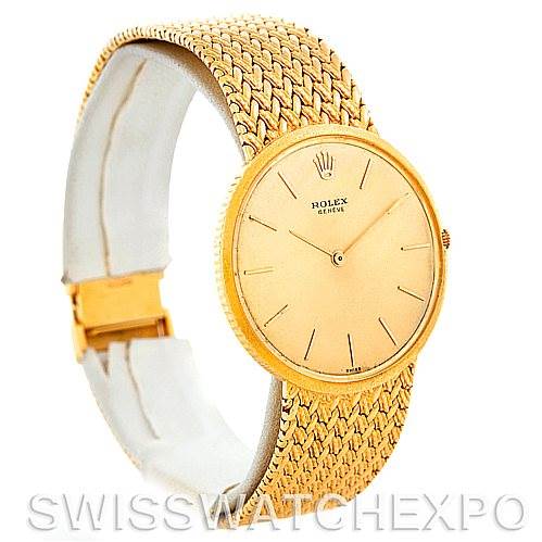 The image shows a side angle of the Vintage Collection Rolex watch, highlighting its gold case, dial, and woven bracelet.