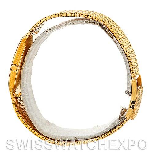 The image shows a side view of a Rolex Vintage Collection 9577 Men's Yellow Gold Champagne Dial 9577 Men's Yellow Gold Champagne Dial watch, focusing on the band and clasp.