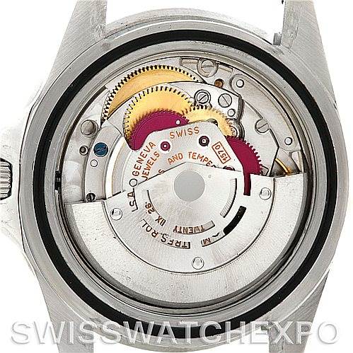 The image shows the movement mechanism of a Rolex Vintage Collection 1675 Men
s Stainless Steel Black Dial 1675 Men
s Stainless Steel Black Dial watch from a back view with the case back removed.
