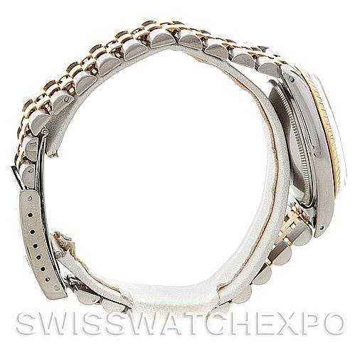 This image shows a side view of the Rolex Vintage Collection 15053 Men's Stainless Steel Silver Dial 15053 Men's Stainless Steel Silver Dial watch, highlighting its bracelet, clasp, and case.