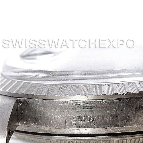 This image shows the side view of the bezel and case of the Vintage Collection model by Rolex, highlighting the serial number.