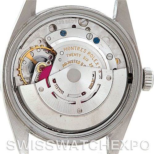 This image shows the inner mechanism of a Vintage Collection Rolex watch, viewed from the back case.