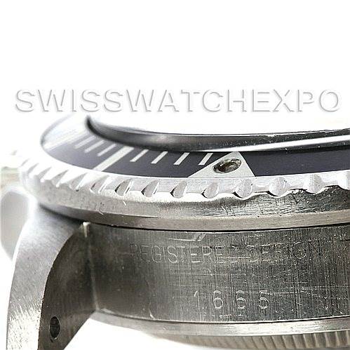 The image shows a close-up side view of the bezel, case, and part of the band lugs of a Rolex Vintage Collection 1665 Men's Stainless Steel  1665 Men's Stainless Steel  model watch.