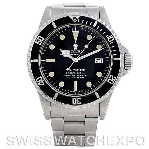 The image shows a front view of a Rolex Vintage Collection 1665 Men's Stainless Steel  1665 Men's Stainless Steel  Sea-Dweller watch, showcasing its dial, bezel, and bracelet.