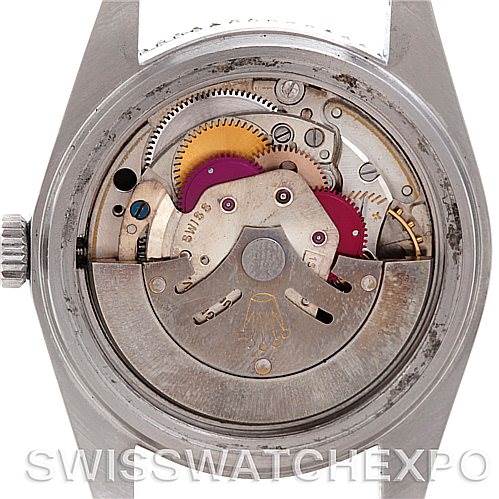 This image shows the internal mechanisms of a Vintage Collection Rolex watch from a rear angle with the case back removed.