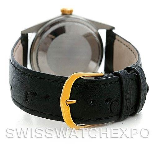 This image shows the back of a Rolex Vintage Collection 16013 Men's Stainless Steel Champagne Dial 16013 Men's Stainless Steel Champagne Dial watch, including the case and black leather strap with a gold buckle.