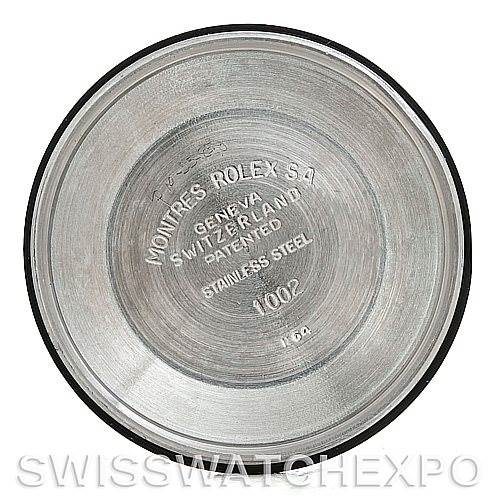 The image shows the inside case back of a Vintage Collection Rolex watch, displaying engraving details.