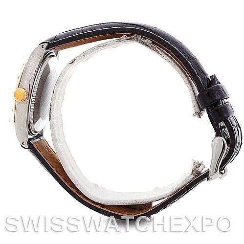 This image shows a side view of a Rolex Vintage Collection 1002 Men's Steel and Gold (two tone) Silver Dial 1002 Men's Steel and Gold (two tone) Silver Dial watch, highlighting the black strap and the watch case.