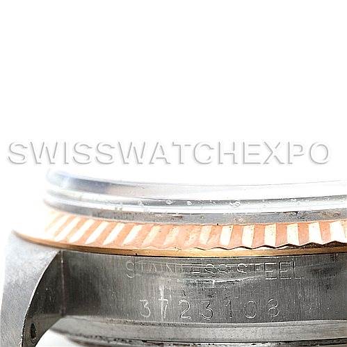 This image shows a close-up side view of the bezel and engraving on a Vintage Collection Rolex watch.