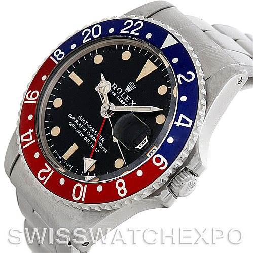 This image shows a Rolex Vintage Collection 1675 Men's Stainless Steel Black Dial 1675 Men's Stainless Steel Black Dial watch, viewed from a front-left angle, highlighting its black dial and red-blue bezel.