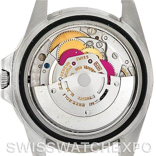 The image shows the back view of a Rolex Vintage Collection 1675 Men's Stainless Steel Black Dial 1675 Men's Stainless Steel Black Dial watch, revealing its internal mechanical movement.