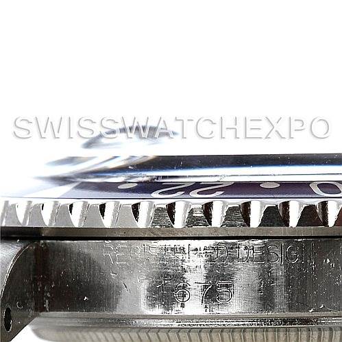 The image shows a close-up of the side and bezel of the Vintage Collection Rolex watch.