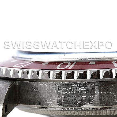 The image shows a close-up side view of the bezel and case of the Rolex Vintage Collection 1675 Men's Stainless Steel Black Dial 1675 Men's Stainless Steel Black Dial watch, highlighting its serial number.