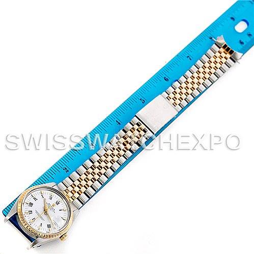 The Rolex Vintage Collection 15053 Men's Stainless Steel White Dial 15053 Men's Stainless Steel White Dial watch is shown from a top-down angle with its full bracelet and case clearly visible next to a ruler.