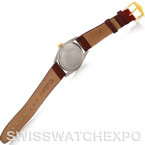 This image shows the back view of a Rolex Vintage Collection 1601 Men's Stainless Steel Silver Dial 1601 Men's Stainless Steel Silver Dial watch with a brown leather strap fully extended.