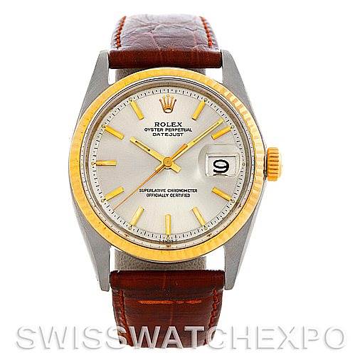 This image shows the front view of a Rolex Vintage Collection 1601 Men's Stainless Steel Silver Dial 1601 Men's Stainless Steel Silver Dial Oyster Perpetual Datejust watch with a gold bezel and a brown leather strap.