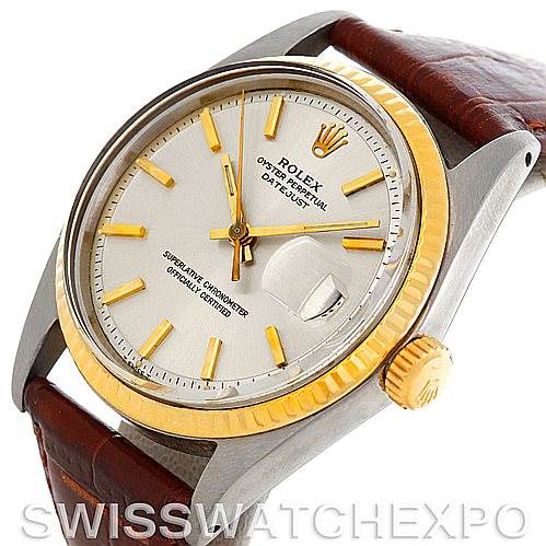 The image shows a Rolex Vintage Collection 1601 Men's Stainless Steel Silver Dial 1601 Men's Stainless Steel Silver Dial watch at an angle highlighting the face, crown, and part of the leather strap.