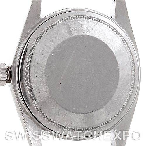 The image shows the back case and crown of a Vintage Collection Rolex watch.